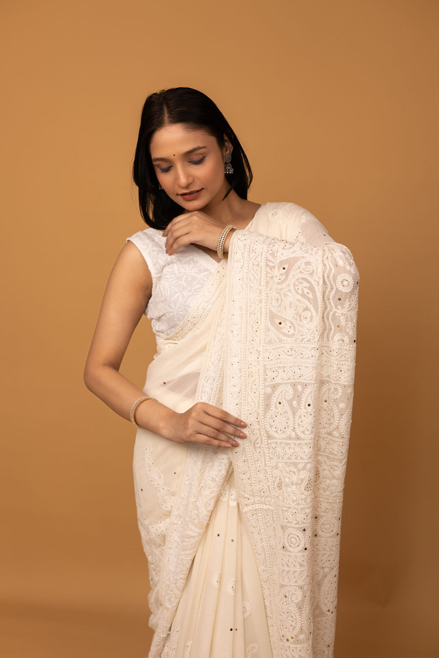 Hansini | Ivory Raag Pure Georgette Chikankari Saree