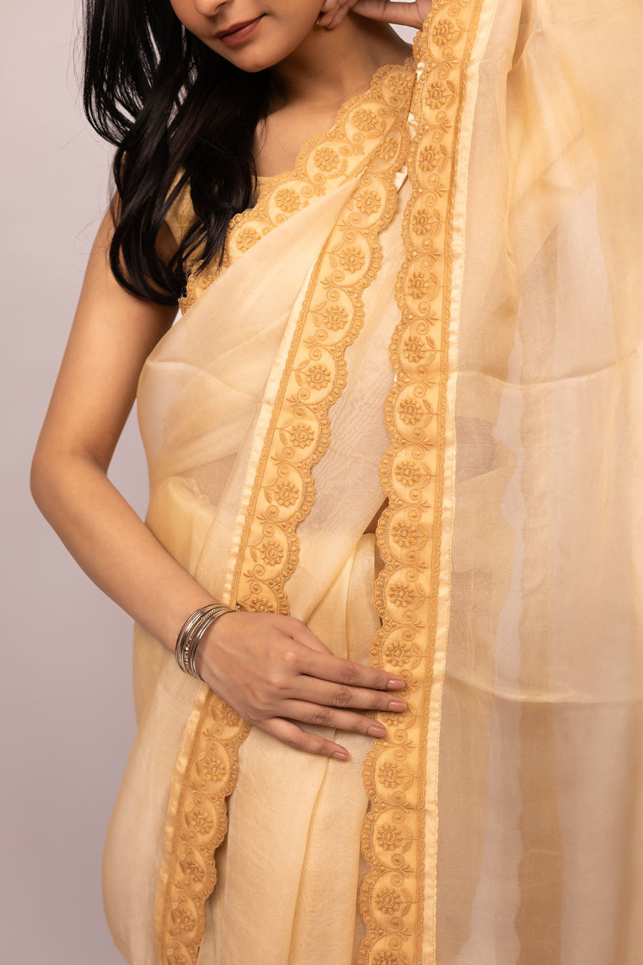 Urvashi | Latte Beige Organza Silk Saree with intricate Chikankari
