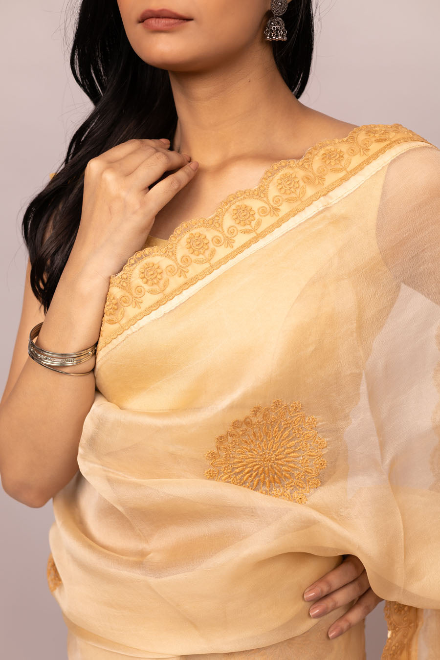 Urvashi | Latte Beige Organza Silk Saree with intricate Chikankari
