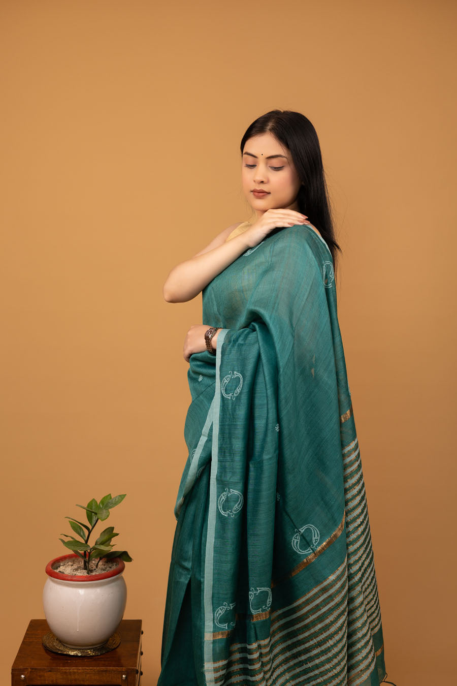 Rama Green Tussar Moonga Silk Saree with golden designer pallu and chikankari embroidery