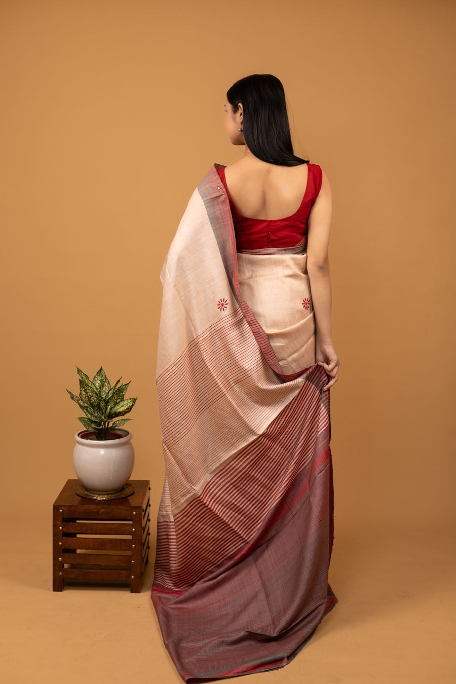Urvashi | Coral Peach Tussar Moonga Silk Chikankari Saree