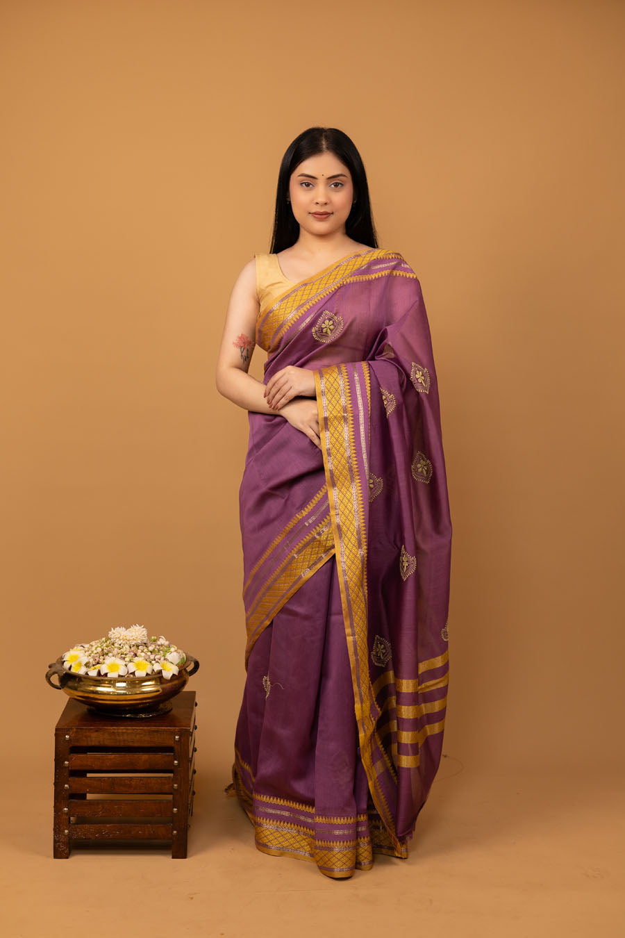 Lady wearing Purple Mangalgiri Chikankari saree front view