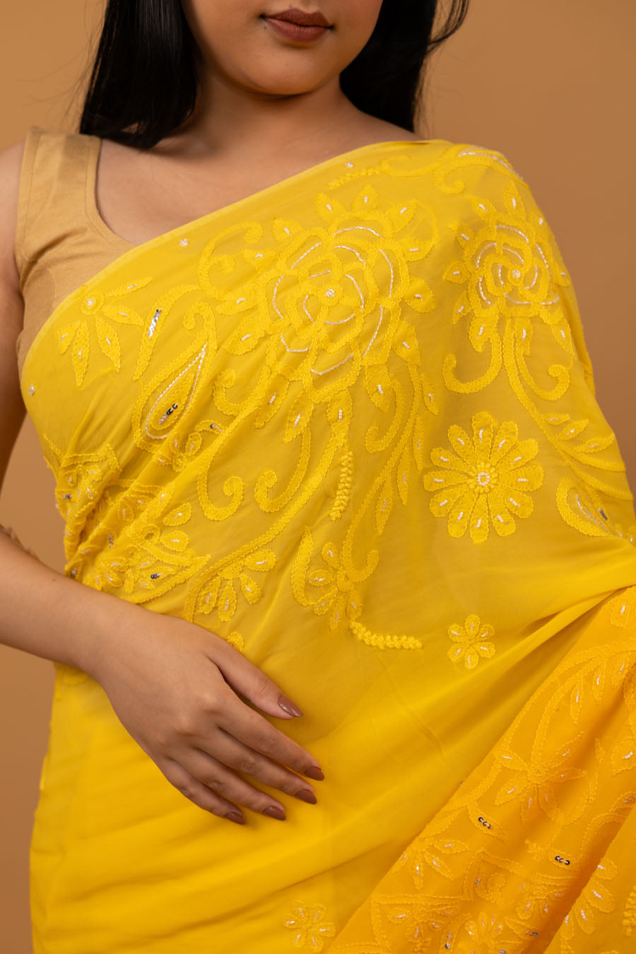 Closeup embroidery of Yellow Georgette Chikankari Saree