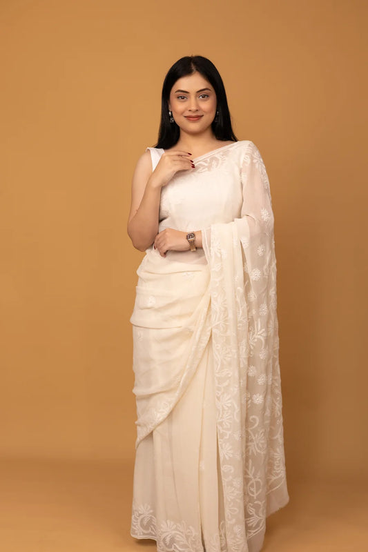 cream chikankari saree with floral embroidery
