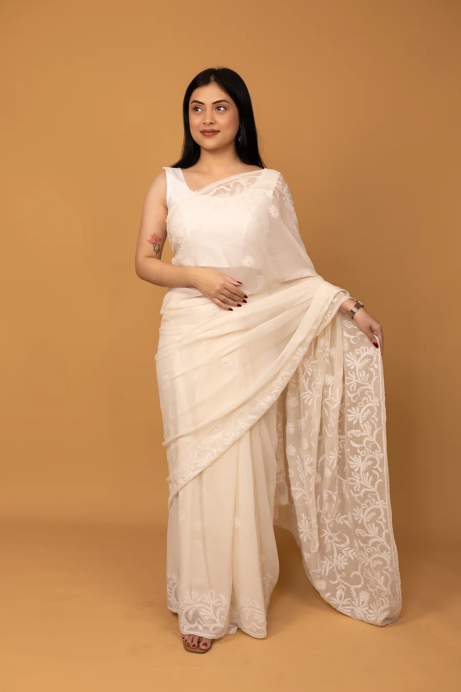 elegant white saree with handmade chikankari work