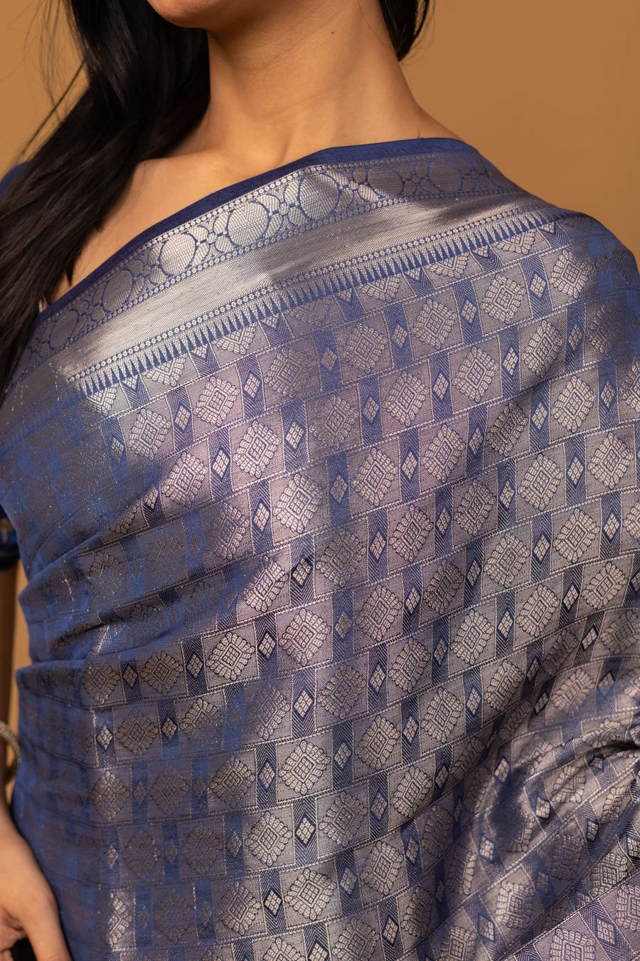 Navy blue silk saree with silver zari weaving and designer border